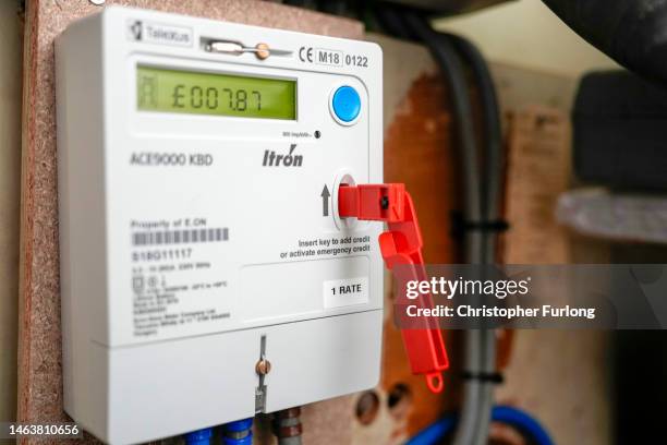 In this photo illustration a prepay electricity key sits in a prepayment electricity meter in a rented home on February 07, 2023 in Birmingham,...