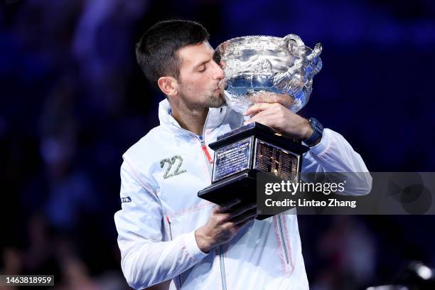 Novak Djokovic of Serbia poses with the Norman Brookes Challenge Cup after winning the Men's Singles Final match against Stefanos Tsitsipas of Greece...