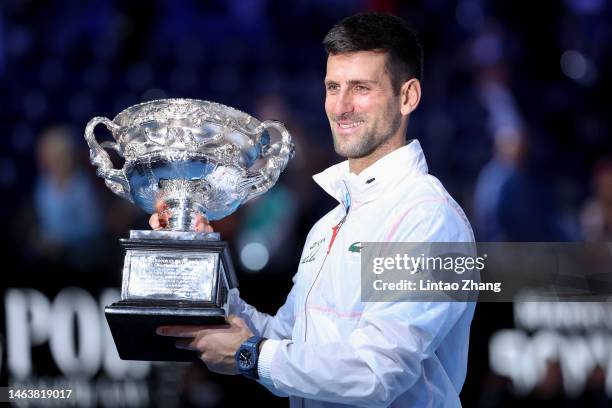 Novak Djokovic of Serbia poses with the Norman Brookes Challenge Cup after winning the Men's Singles Final match against Stefanos Tsitsipas of Greece...