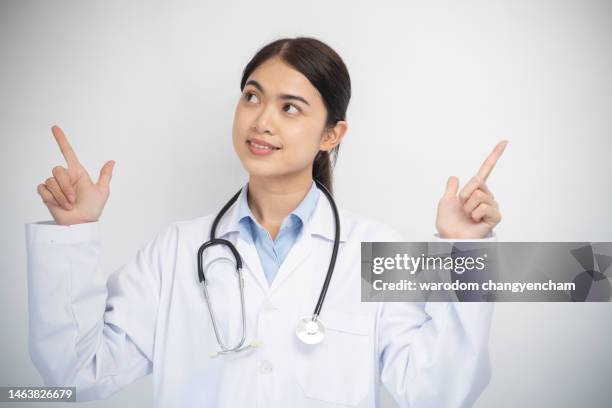 Doctor Point Woman 8,260 Doctor Pointing Stock Photos, High-Res Pictures, and Images ...