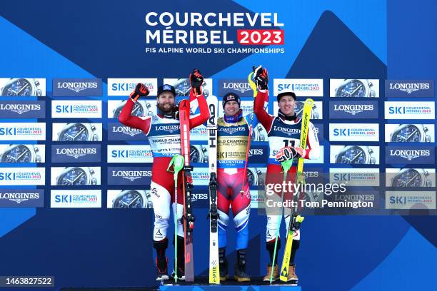 Silver medalist Marco Schwarz of Austria, gold medalist Alexis Pinturault of France and bronze medalist Raphael Haaser of Austria poses for a photo...