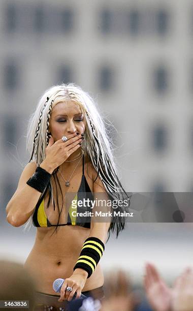 Singer Christina Aguilera performs for "TRL Presents: Christina Stripped in NYC 2002 at Brooklyn Bridge" October 7, 2002 at Empire Fulton State Park...