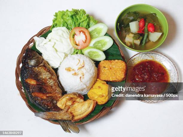directly above shot of food served on white background,jakarta,indonesia - jakarta stock pictures, royalty-free photos & images