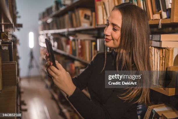 Library Study Phone Librarian Phone Photos and Premium High Res Pictures - Getty Images