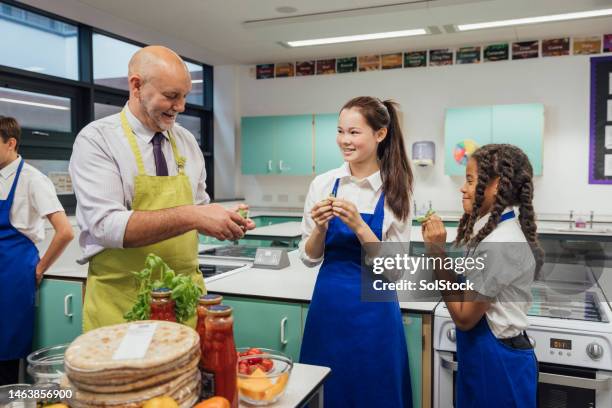 try adding into food - taste test stock pictures, royalty-free photos & images