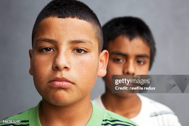 two mexican serious kids. - children only stock pictures, royalty-free photos & images