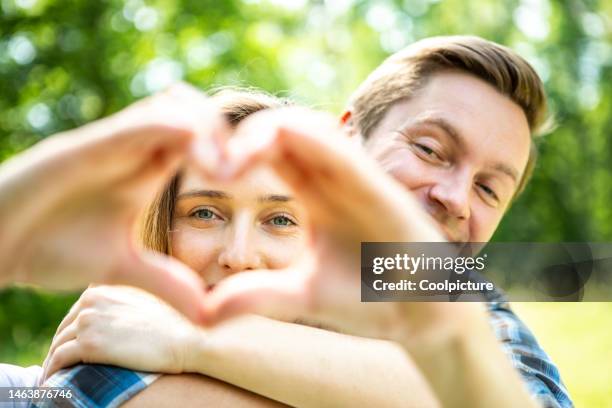 young couple in love. - young couple holding hands stock pictures, royalty-free photos & images