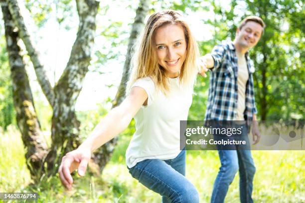 young couple in love. - young couple holding hands stock pictures, royalty-free photos & images