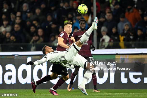 Krzysztof Piatek of Salernitana battles for possession with Danilo of Juventus during the Serie A match between Salernitana and Juventus at Stadio...