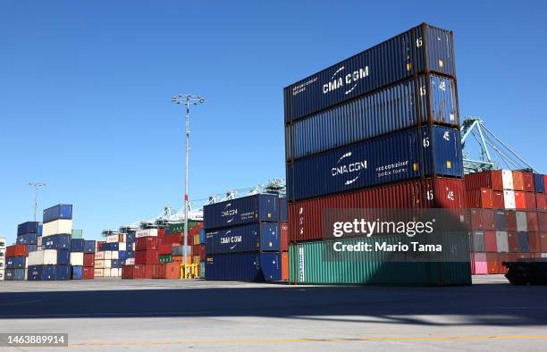 Shipping containers are stacked at the Port of Los Angeles on February 7, 2023 in Los Angeles, California. The Commerce Department reported today...