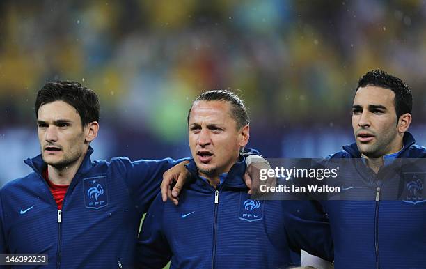 Hugo Lloris, Philippe Mexes and Adil Rami of France line up during the UEFA EURO 2012 group D match between Ukraine and France at Donbass Arena on...