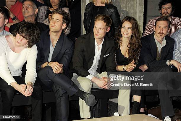 George Craig, Oliver Jackson-Cohen, Jack Fox, Lily James and Tim Downie attend the Spencer Hart Spring/Summer 2013 catwalk show during London...
