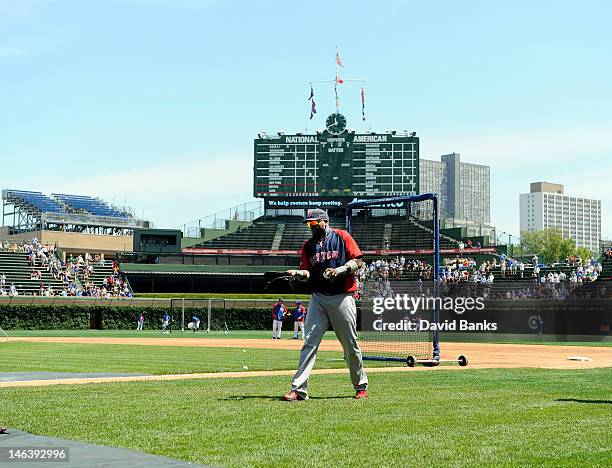 David Ortiz of the Boston Red Sox warms up before a game against the Chicago Cubs on June 15, 2012 at Wrigley Field in Chicago, Illinois.