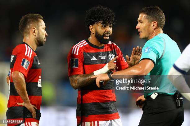 Everton Ribeiro and Gabriel Barbosa of Flamengo in discussion with referee Istvan Kovacs during the FIFA Club World Cup Morocco 2022 Semi Final match...