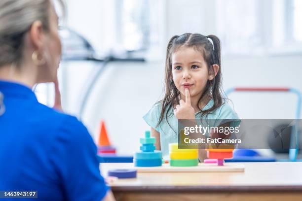 speech therapy - speech stock pictures, royalty-free photos & images