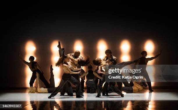 Dancers of Ballets Jazz Montréal perform during the press call for "Dance Me – Music by Leonard Cohen" at Sadlers Wells Theatre on February 7, 2023...