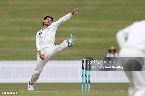 New Zealand XI Sean Solia bowls during day one of the Tour match between New Zealand XI and England at Seddon Park on February 08, 2023 in Hamilton,...