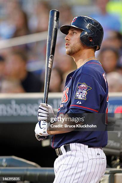 Trevor Plouffe of the Minnesota Twins prepares to bat against the Philadelphia Phillies on June 12, 2012 at Target Field in Minneapolis, Minnesota....