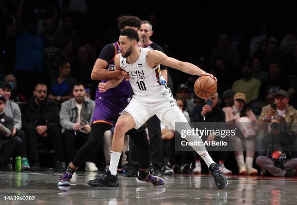 Ben Simmons of the Brooklyn Nets drives against the Phoenix Suns during their game at Barclays Center on February 07, 2023 in New York City. User...