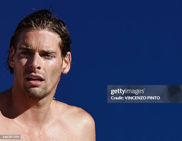 France's Camille Lacourt looks on at the end of the Men's 100m Backstroke final during the swimming event Settecolli trophy at Rome's Foro Italico on...