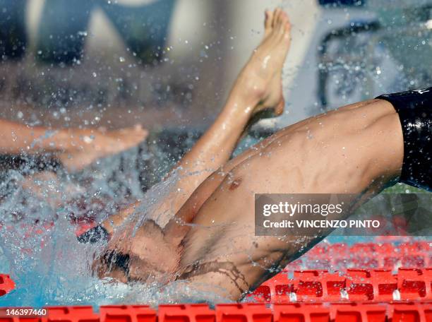 French swimmer Camille Lacourt competes in the men's 100-metre backstroke final at the Settecolli Trophy on June 15, 2012 at Rome's Foro Italico. AFP...
