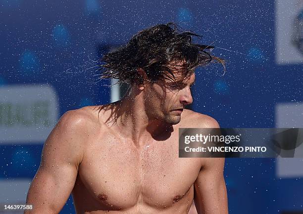 Second placed French swimmer Camille Lacourt gestures after the men's 100-metre backstroke final at the Settecolli Trophy on June 15, 2012 at Rome's...