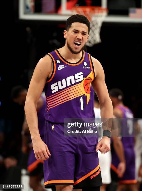 Devin Booker of the Phoenix Suns celebrates against the Brooklyn Nets during their game at Barclays Center on February 07, 2023 in New York City....