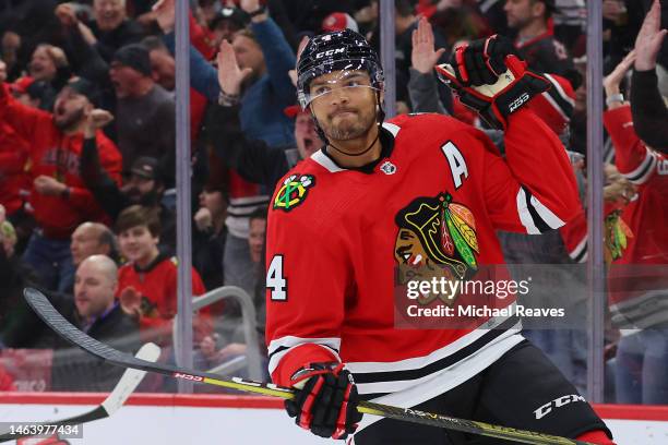 Seth Jones of the Chicago Blackhawks celebrates after scoring a goal against the Anaheim Ducks during the second period at United Center on February...