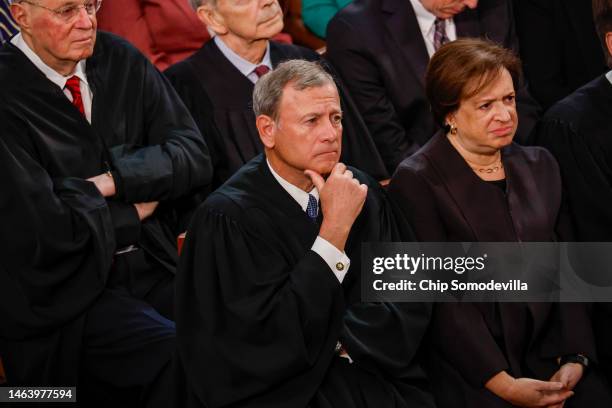 Chief Justice of the United States John Roberts and U.S. Supreme Court Justice Elena Kagan listen as U.S. President Joe Biden delivers his State of...