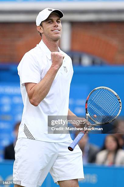 Sam Querrey of the USA celebrates match point during his mens singles quarter-final round match against Ivan Dodig of Croatia on day five of the...