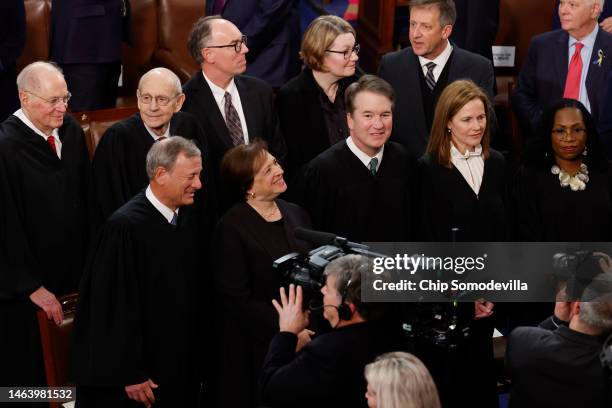 Retired U.S. Supreme Court Justices Anthony Kennedy and Stephen Breyer, Chief Justice John Roberts, Justice Elena Kagan, Justice Brett Kavanaugh,...