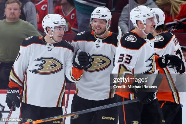 Frank Vatrano of the Anaheim Ducks celebrates with teammates after scoring a game winning goal in overtime against the Chicago Blackhawks at United...