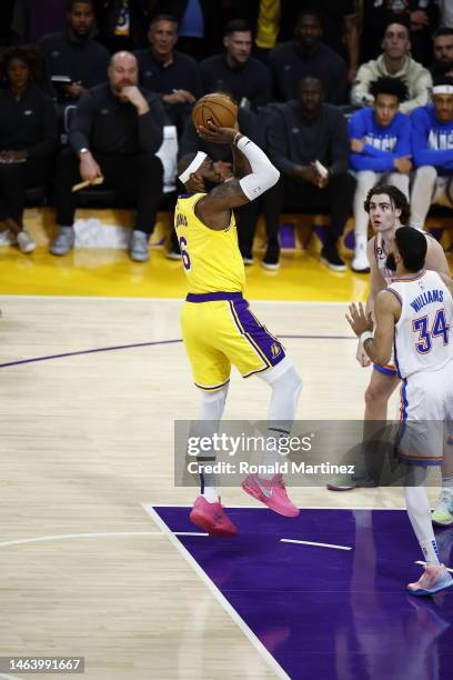 LeBron James of the Los Angeles Lakers scores to pass Kareem Abdul-Jabbar to become the NBA's all-time leading scorer, surpassing Abdul-Jabbar's...