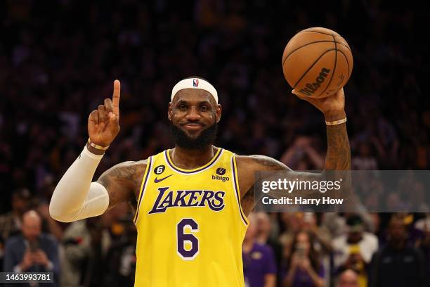 LeBron James of the Los Angeles Lakers reacts after scoring to pass Kareem Abdul-Jabbar to become the NBA's all-time leading scorer, surpassing...
