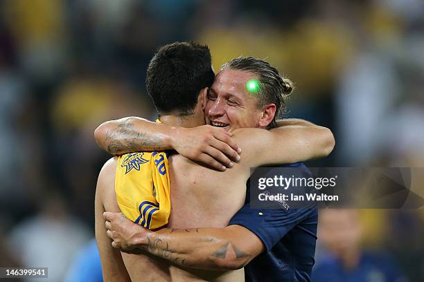 Laser is directed at the head of Philippe Mexes of France as he celebrates victory with team-mate Adil Rami after the UEFA EURO 2012 group D match...