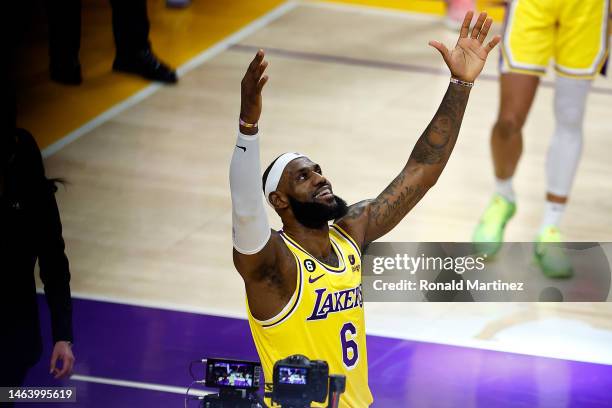 LeBron James of the Los Angeles Lakers reacts after scoring to pass Kareem Abdul-Jabbar to become the NBA's all-time leading scorer, surpassing...