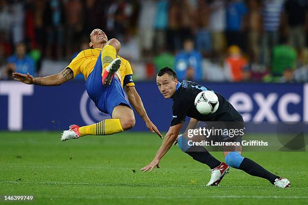 Zlatan Ibrahimovic of Sweden and John Terry of England compete for the ball during the UEFA EURO 2012 group D match between Sweden and England at The...