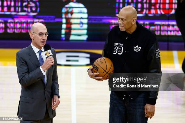 Commissioner Adam Silver speaks as Kareem Abdul-Jabbar looks on after LeBron James of the Los Angeles Lakers passed Abdul-Jabbar to become the NBA's...