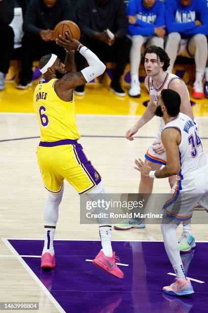 LeBron James of the Los Angeles Lakers scores to pass Kareem Abdul-Jabbar to become the NBA's all-time leading scorer, surpassing Abdul-Jabbar's...