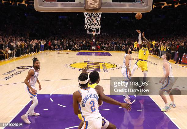 LeBron James of the Los Angeles Lakers scores on a jumper to pass Kareem Abdul-Jabbar to become the NBA's all-time leading scorer, surpassing...