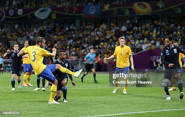 Olof Mellberg of Sweden scores their first goal during the UEFA EURO 2012 group D match between Sweden and England at The Olympic Stadium on June 15,...