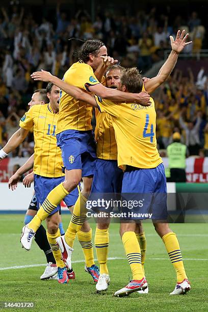 Sweden celebrate after Olof Mellberg of Sweden scored their second goal goal during the UEFA EURO 2012 group D match between Sweden and England at...