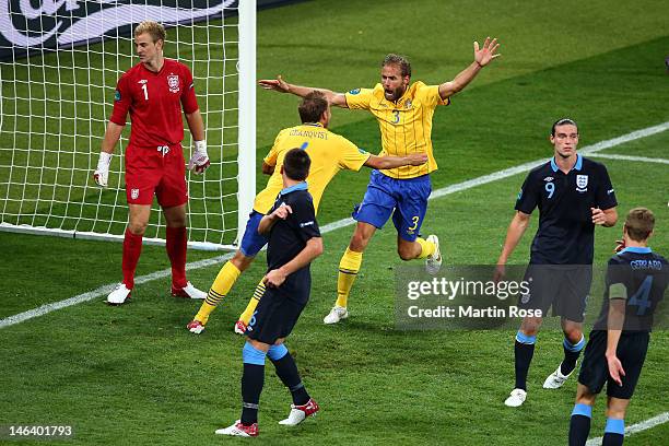 Sweden celebrate after Olof Mellberg of Sweden scored their second goal goal during the UEFA EURO 2012 group D match between Sweden and England at...