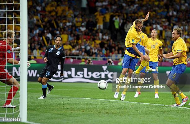 Olof Mellberg of Sweden scores their second goal during the UEFA EURO 2012 group D match between Sweden and England at The Olympic Stadium on June...