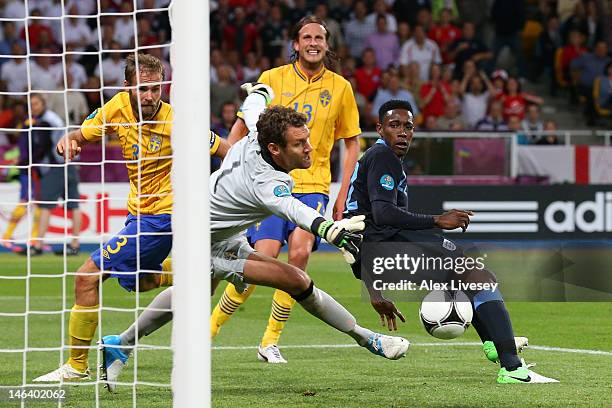 Danny Welbeck of England scores their third goal past Andreas Isaksson of Sweden during the UEFA EURO 2012 group D match between Sweden and England...