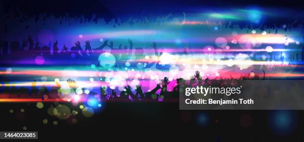 neon dance party crowd background - concert crowd silhouette stock illustrations