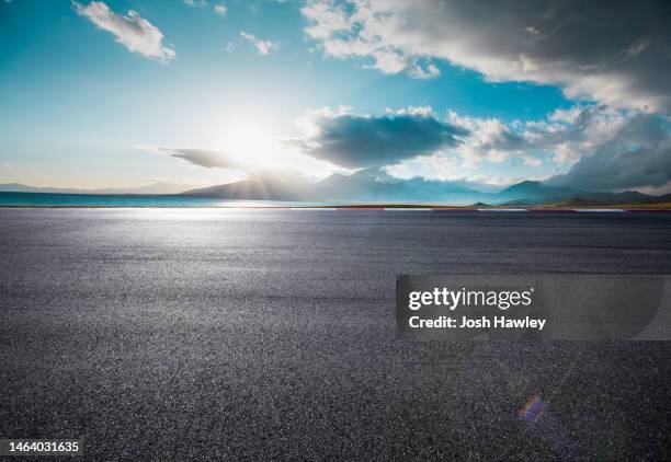 seaside road and parking lot - asphalt stock pictures, royalty-free photos & images