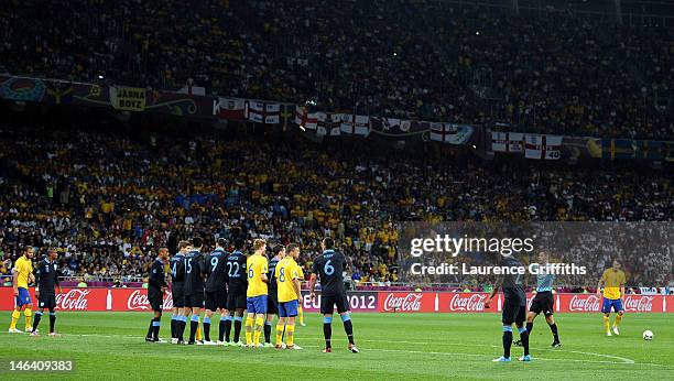 Referee Damir Skomina lines up the wall for a Sweden freekick during the UEFA EURO 2012 group D match between Sweden and England at The Olympic...