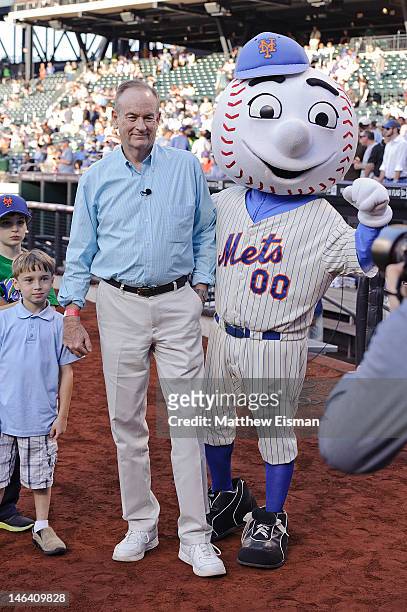 News anchor Bill O'Reilly throws out the ceremonial first pitch at Citi Field on June 15, 2012 in the Queens borough of New York City.