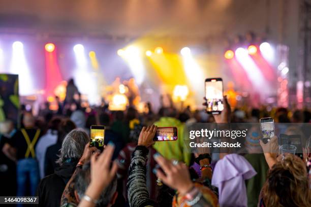 digital age at live festival - music festival phone stock pictures, royalty-free photos & images